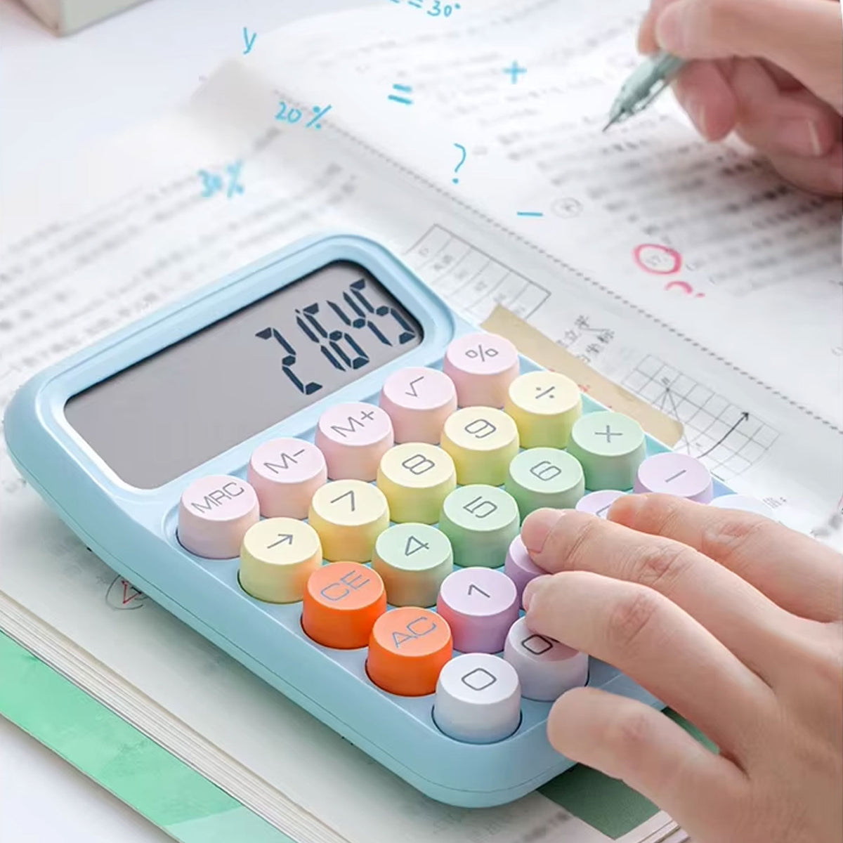 Close-up of multicolored round keys on a digital calculator